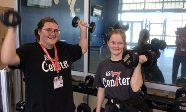 Students Lifting Weights